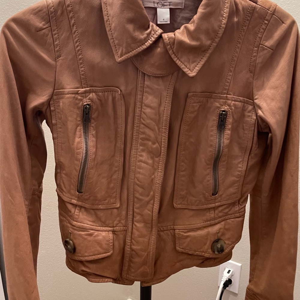 Leather jacket great color and fits snug and sexy waist